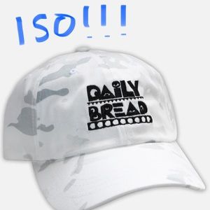 ISO Daily Bread white camp dad hat with a brass adjustment